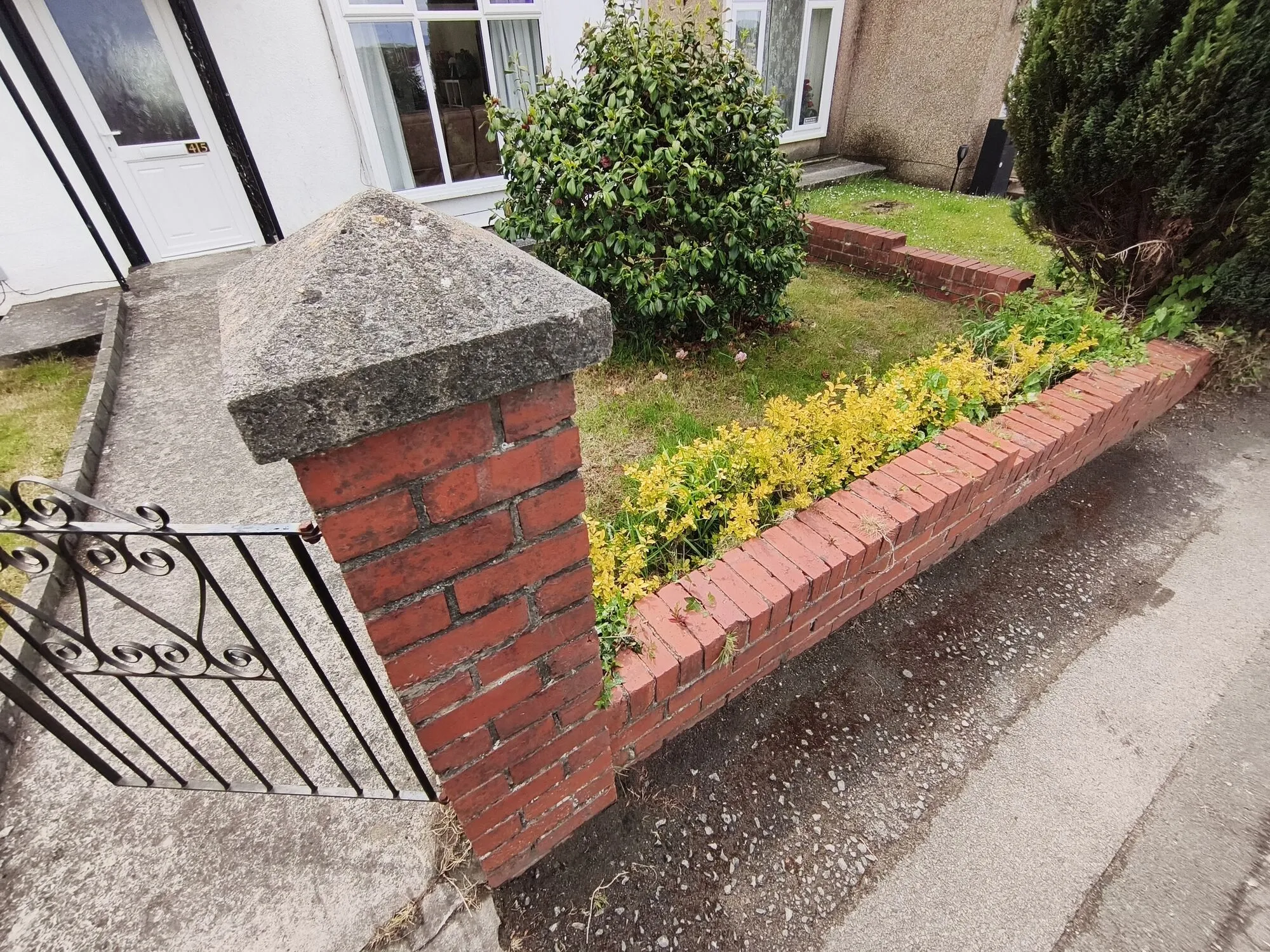 Before exterior wall cleaning: weathered walls with surface staining